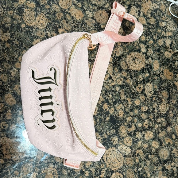 Juicy Couture Handbags - Juicy Couture Light Pink Embossed Belt Bag
